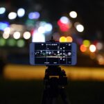 Night scene captured on smartphone with bokeh lighting effect for creative photography.